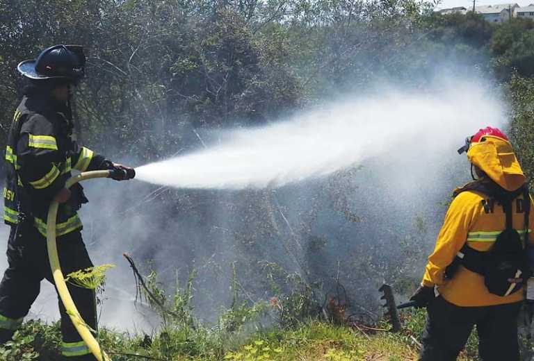 Wild land blaze quickly knocked down