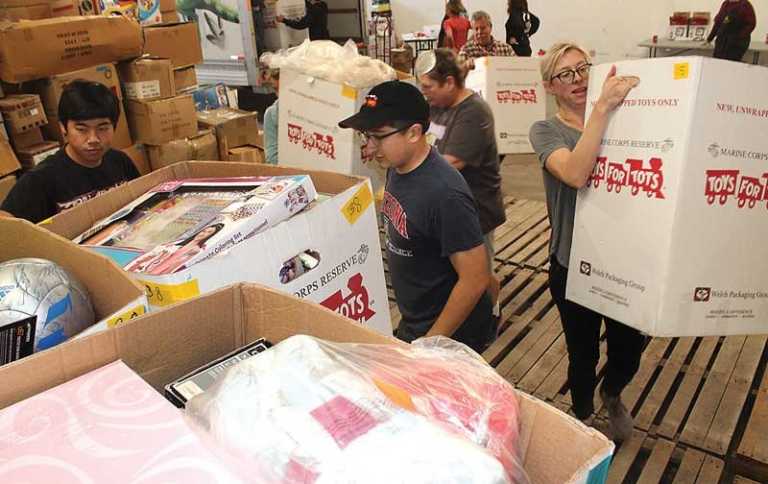 Volunteers prepare Toys for Tots warehouse as giving season begins