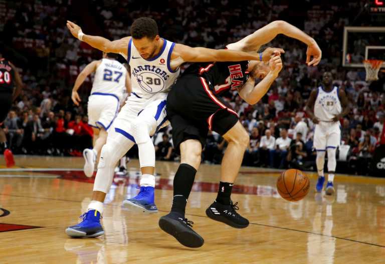 Curry scores 30, Warriors dominate Heat 123-95