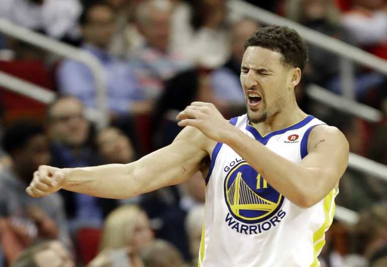 Curry, Thompson help Warriors beat Rockets 124-114