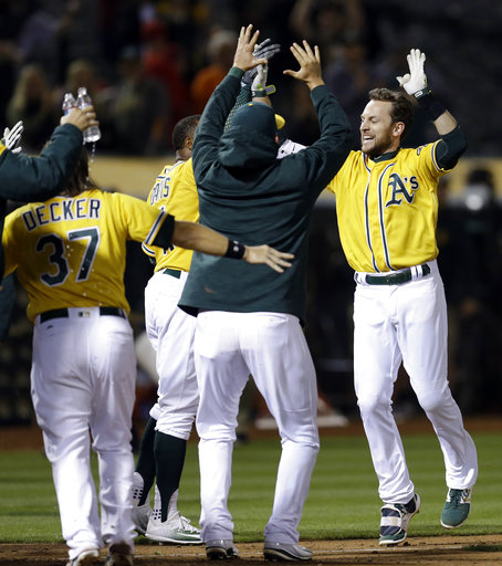 Lowrie gives A's 3rd straight walk-off win, 3-2 over Angels