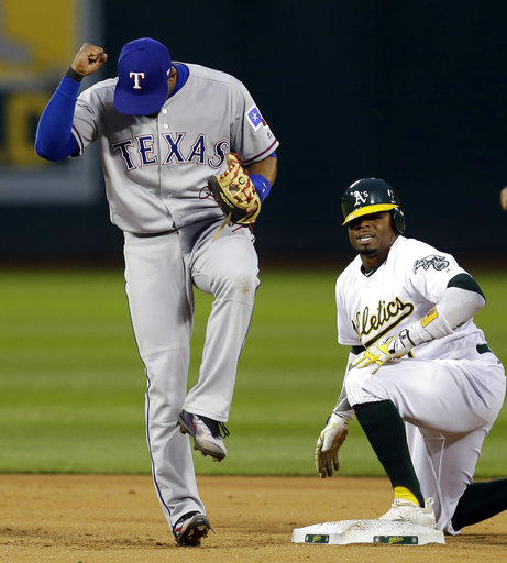 Griffin sharp in return to Oakland as Rangers top A's 7-0