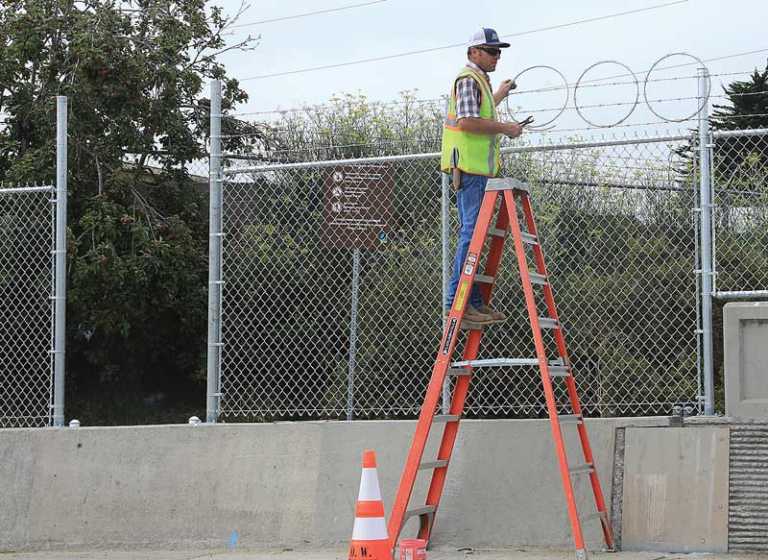 New fence blocks out homeless camp