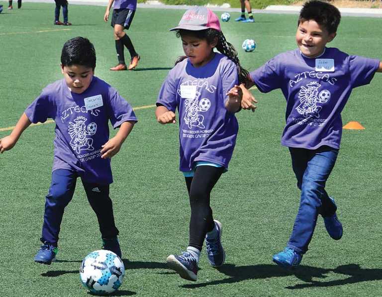 Soccer group scores a goal