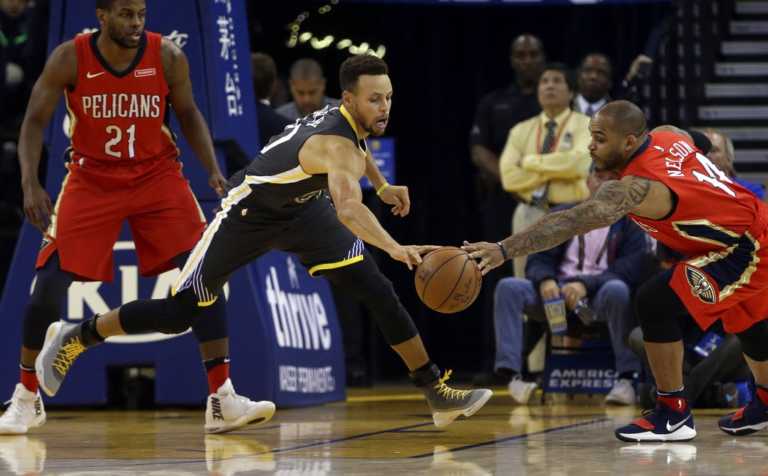 Curry shakes off rugged start to lead Warriors past Pelicans