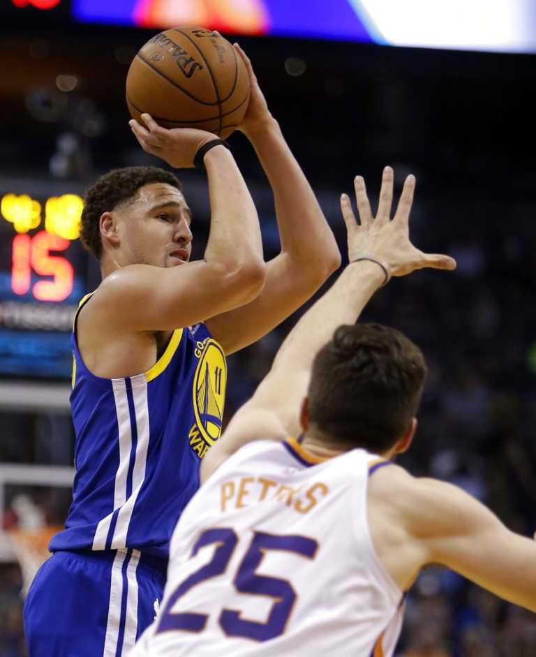 Thompson, Warriors beat Suns for 15th straight time