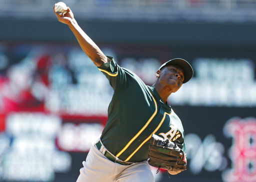 Cotton, A's stop slide with 8-5 win over Twins