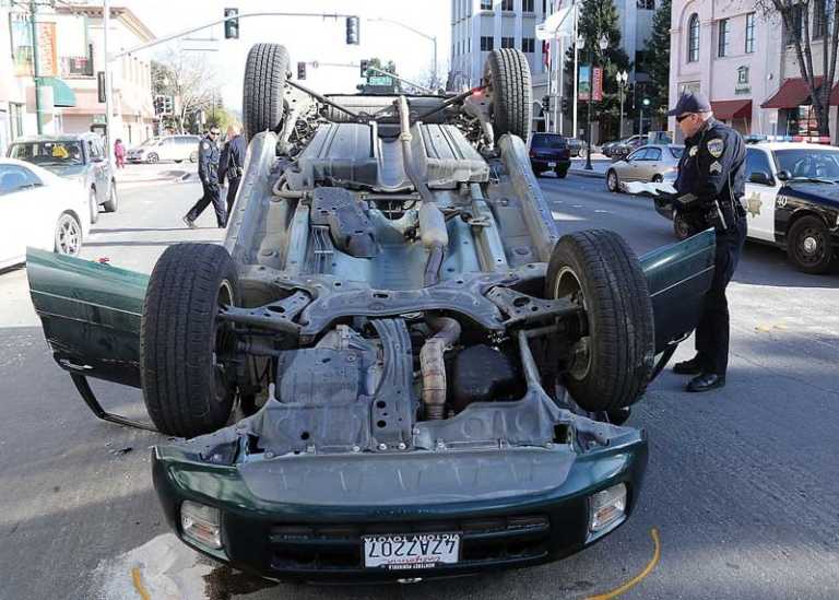 PHOTO: Woman injured in downtown rollover