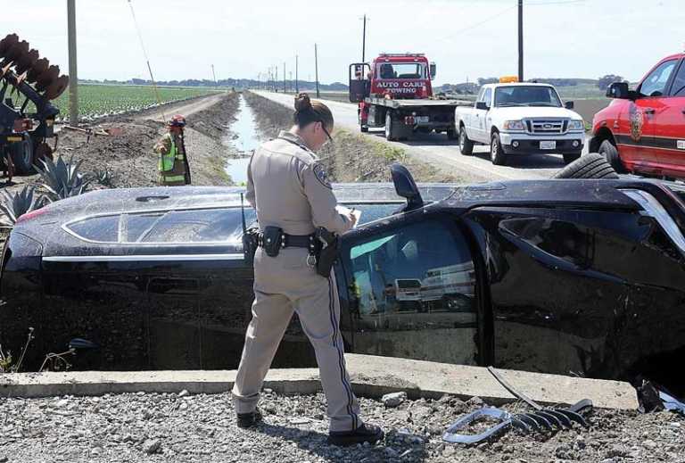 PHOTO: SUV careens into drainage ditch