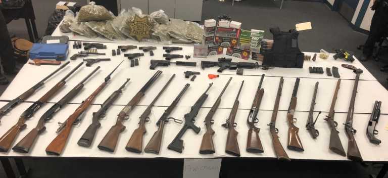 Arrest yields numerous guns, some from gun shop burglary