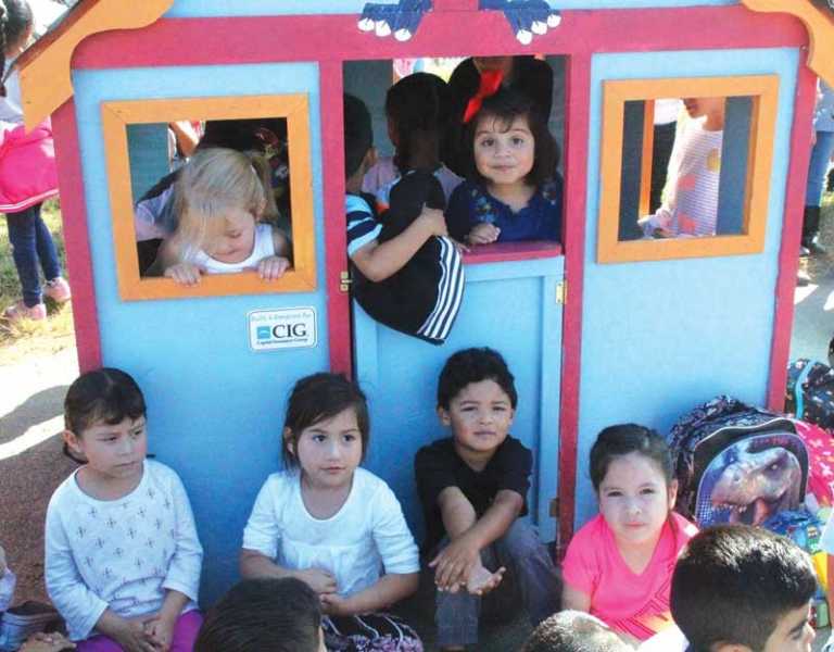 Business, nonprofit team up to build playhouse