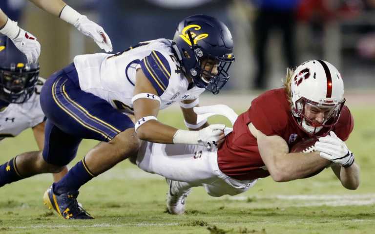 Limping Love helps No. 20 Stanford hold off California 17-14