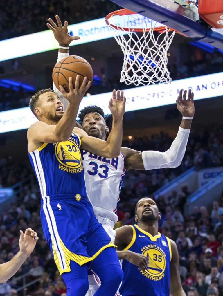 Curry scores 35, Warriors rally to beat 76ers 124-116