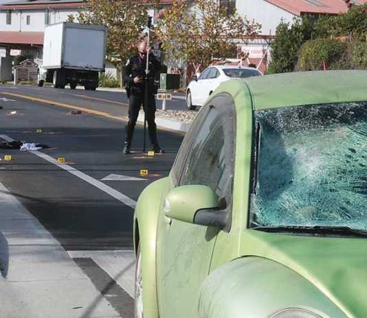 Man struck while crossing Airport Boulevard