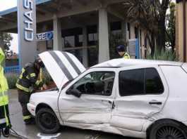 PHOTO: Car knocked onto sidewalk