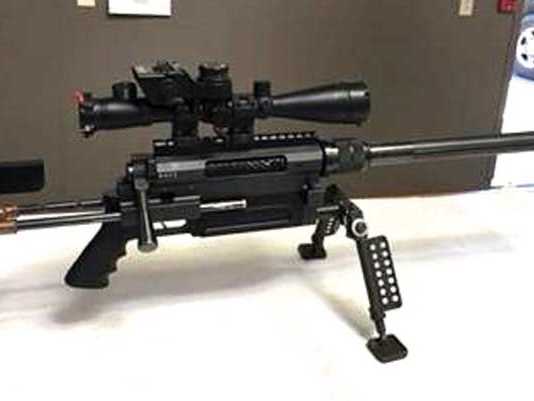 Man arrested with sniper rifle