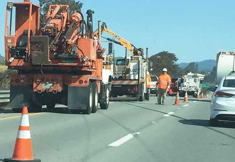 Crews replace damaged Highway 1 guardrail