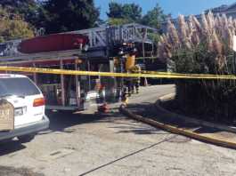 Police officer, two others injured in apartment fire