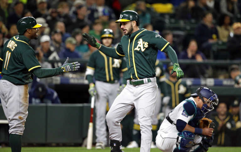 A's rally with 5 runs in 9th on 2 HRs to beat Mariners 9-6