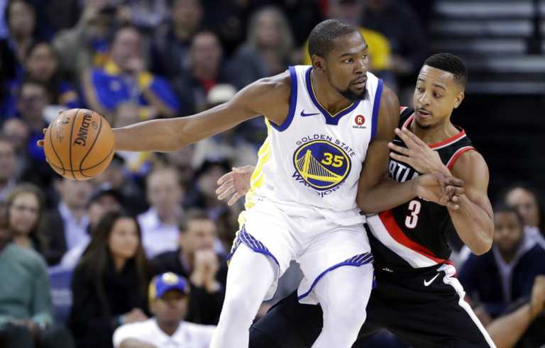 Durant leads short-handed Warriors past Portland 111-104