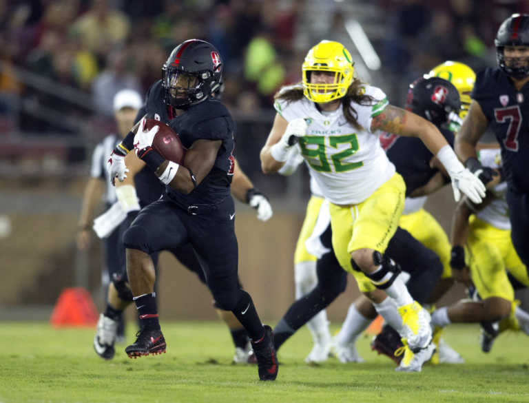 Big game by Love leads No. 23 Stanford past Oregon 49-7