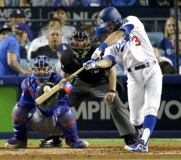 Taylor, Puig power Dodgers past Cubs 5-2 in NLCS Game 1