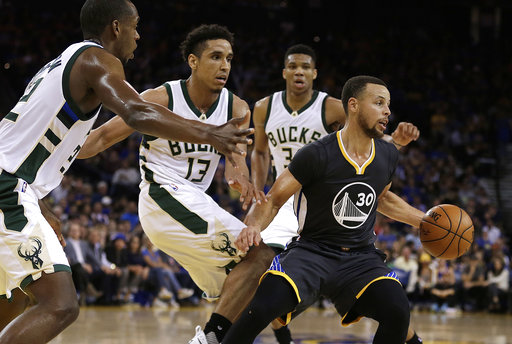 Curry scores 28, Warriors beat Bucks 117-92