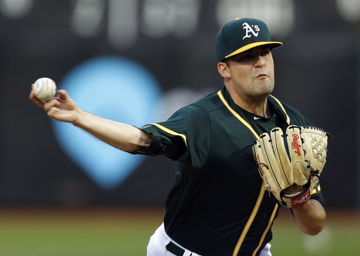 Record-setting Triggs helps A's top Rangers 4-2