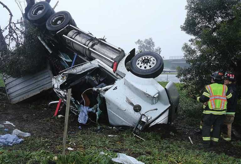 Flipped big rig closes Hwy 1 offramp at Riverside Drive