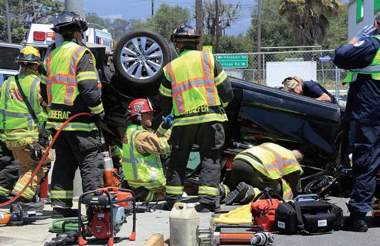 Woman injured in rollover