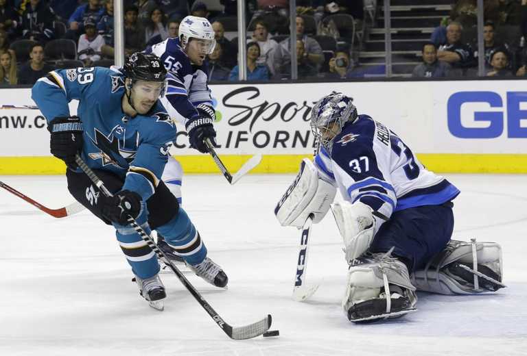 Couture scores twice as Sharks top Jets 4-0