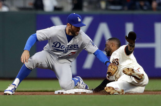 Clayton Kershaw strikes out seven, Dodgers beat Giants 2-1