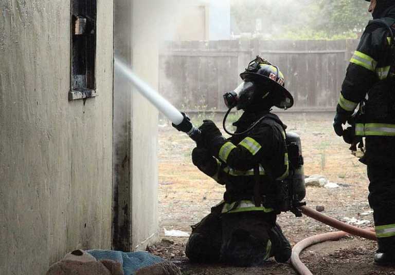 Abandoned structure catches fire on Freedom Blvd.