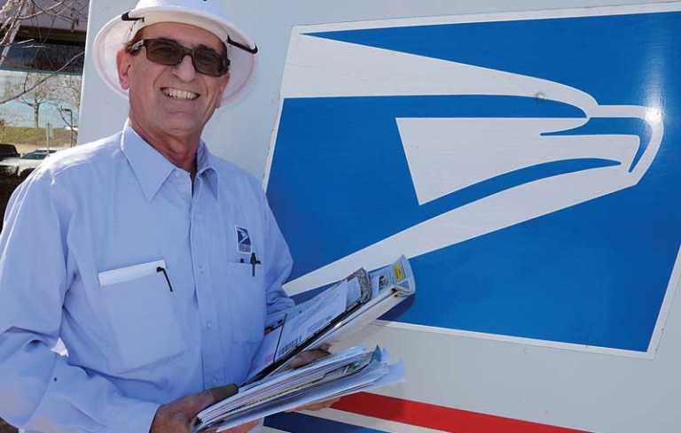 Letter carrier hangs up bag after 35 years