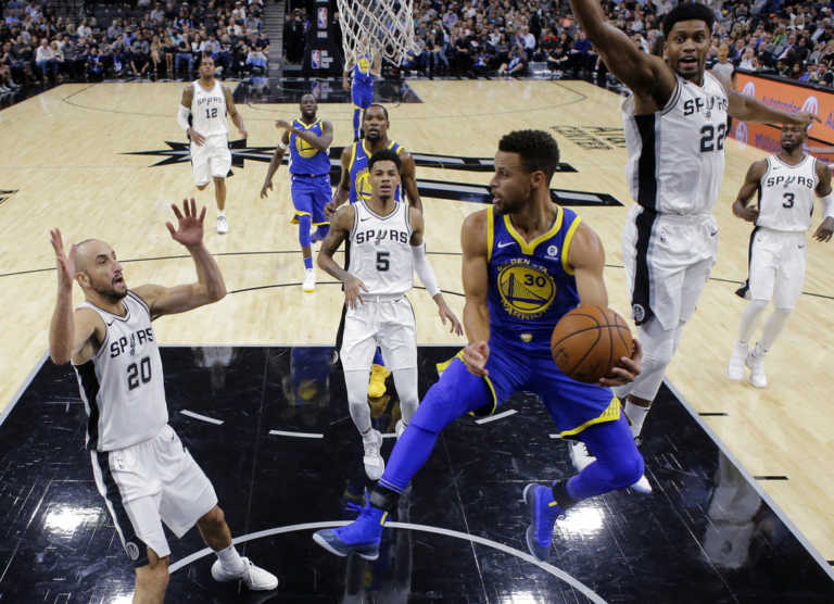 Thompson, Durant lead Warriors past injury-riddled Spurs