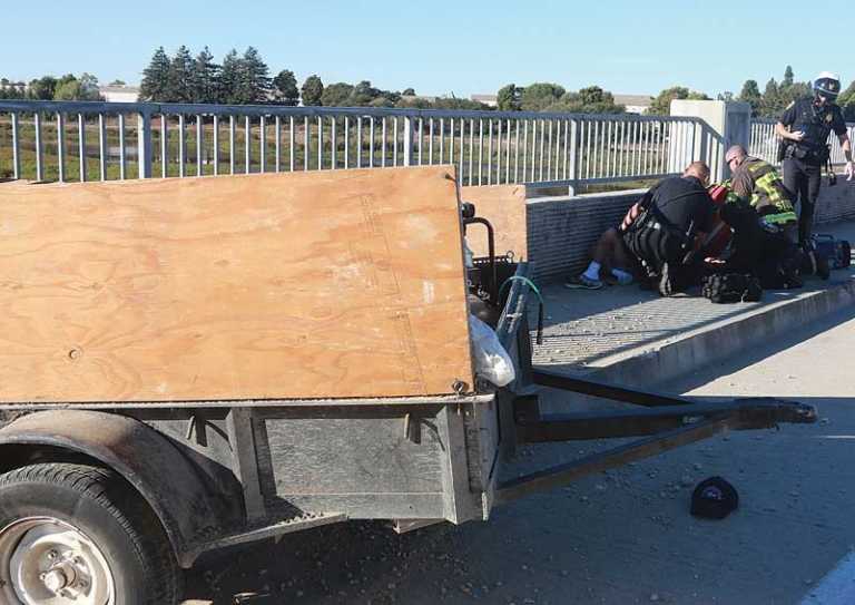 Loose trailer smashes into pedestrian