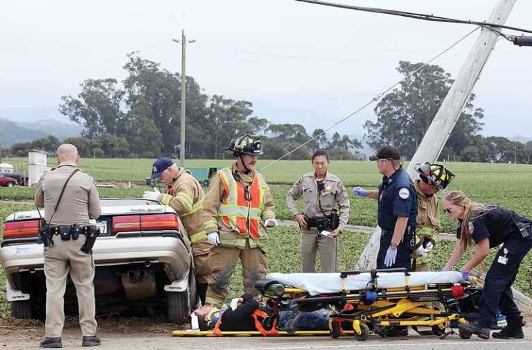 Car shatters utility pole on Highway 1