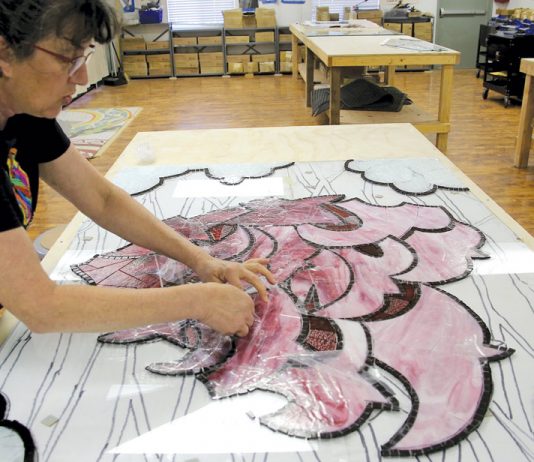 Local artist continues work on community art project