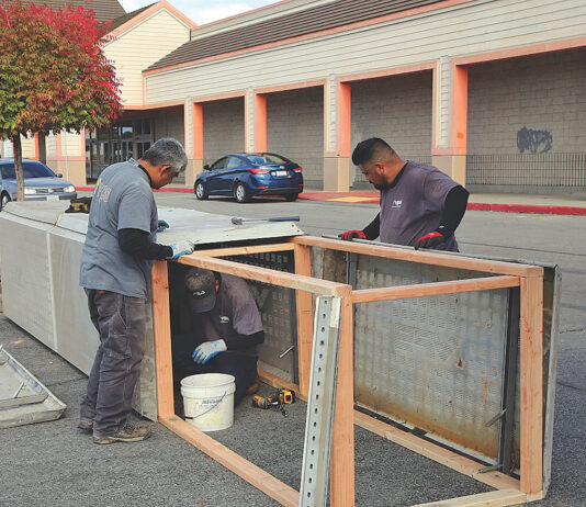 Photo: Traffic blocks go up at Kmart property kmart building