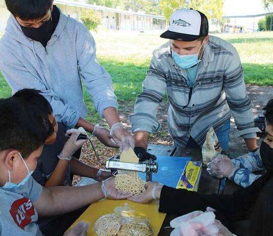 Students learn cooking skills during after-school program