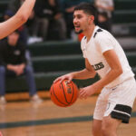 Image for display with article titled Grizzlies continue hunt for first-ever league crown | Boys basketball