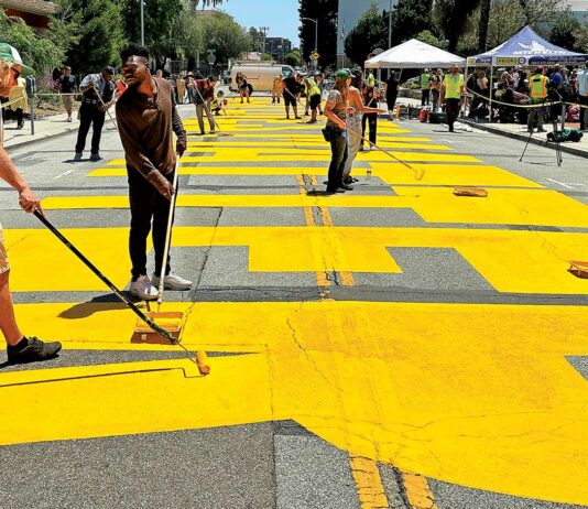 Volunteers gather to repair vandalized Black Lives Matter mural black lives matter mural