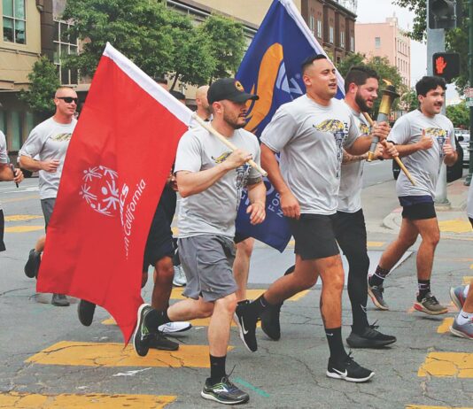 Team effort supports Special Olympics special olympics torch run Watsonville police