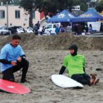 Image for display with article titled On the scene: First responders take part in surf contest