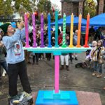 Image for display with article titled PHOTO: Community lights up menorah for Hanukkah