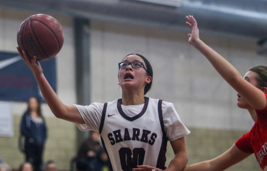 Image for display with article titled Sharks secure first ever outright league title | Girls basketball