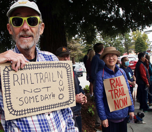 Protesters demand rail-trail project move forward