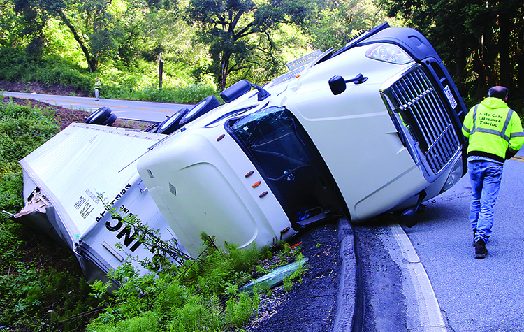 Image for display with article titled Big Rig Flips, Closes Hwy. 152