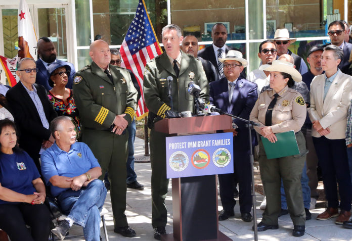 Tri-Co. immigrant presser