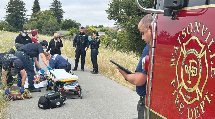 Police and paramedics at the scene of an accident